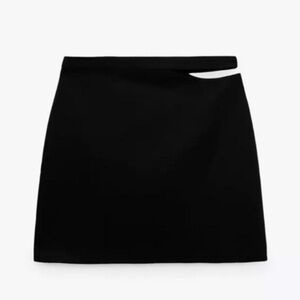 Black mini skirt with cutout